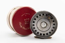 HARDY 'ST JOHN' 3 7/8" FLY REEL, with single black handle, brass tensioner and foot, in red/white