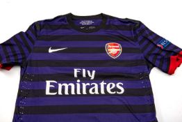UNWORN 2012-13 CHAMPIONS LEAGUE ARSENAL FC AWAY SHIRT, by Nike, size large with Arsenal badge and