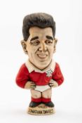 GROGG CARICATURE OF JONATHAN DAVIES standing on titled base, wearing his Wales No.10 kit with