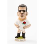 GROGG CARICATURE OF MARTIN JOHNSON (World of Groggs) standing on titled base, wearing his England