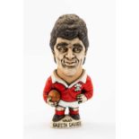 GROGG CARICATURE BY JOHN HUGHES OF GARETH DAVIES standing on titled base, wearing his Wales No.10