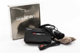 SONY PROFESSIONAL WALKMAN WM-DC6 STEREO CASSETTE RECORDER, with microphone attachment, strap, and