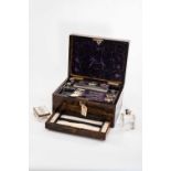 19TH CENTURY ROSEWOOD TOILETTE BOX, hinged lid with inset gilt brass plaque with engraved