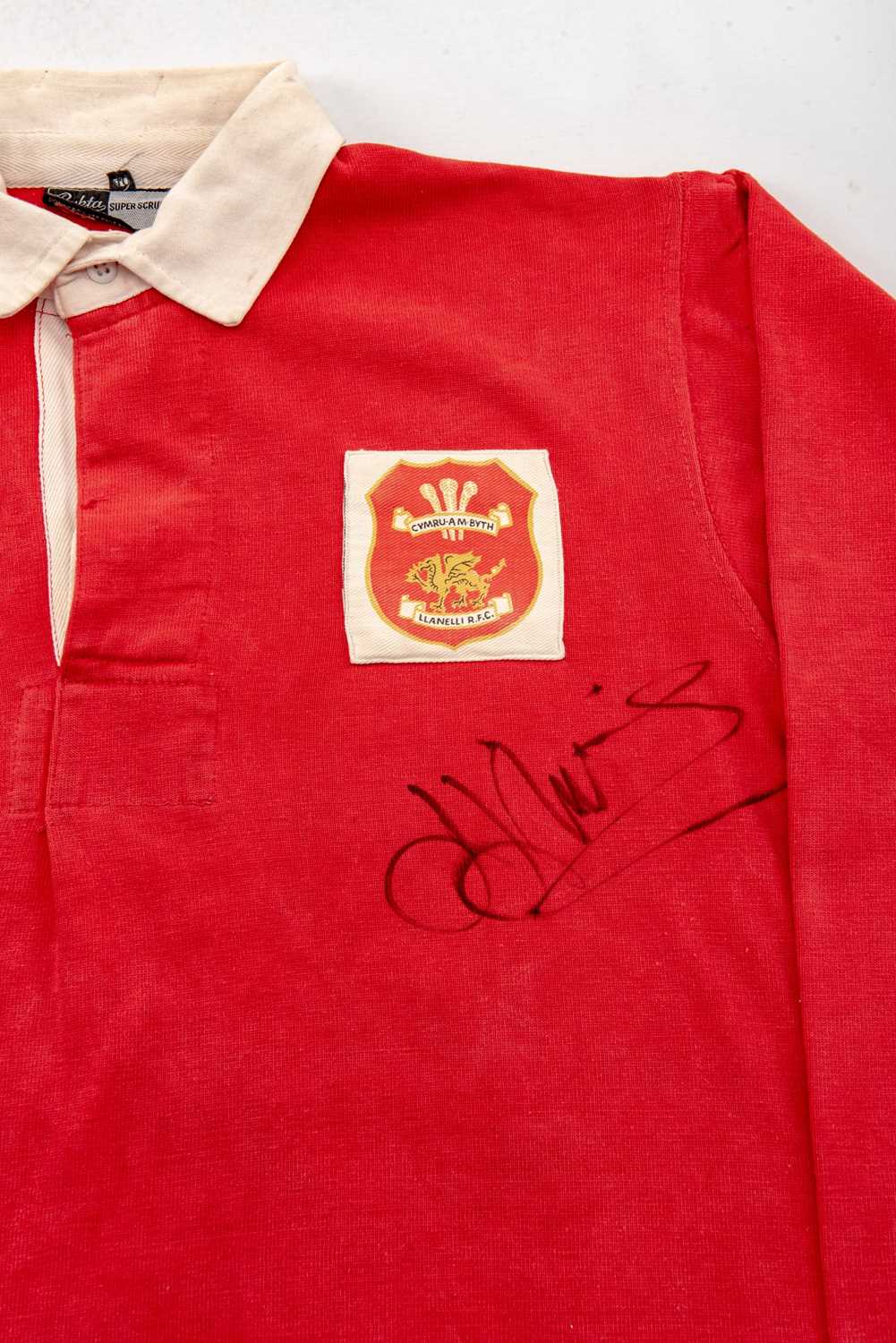 J J WILLIAMS | LLANELLI RFC 1970s match-worn jersey for J J Williams MBE (1948-2020). The jersey