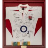 SIGNED ENGLAND INTERNATIONAL RUGBY UNION JERSEY by Nike, with signatures of 2003 World Cup winning