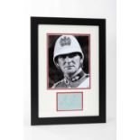 STANLEY BAKER AUTOGRAPH - together with black and white publicity photograph from Zulu, the