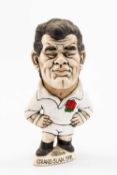 GROGG CARICATURE BY JOHN HUGHES OF WILL CARLING standing on titled base, 'Grand Slam 1991',