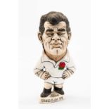 GROGG CARICATURE BY JOHN HUGHES OF WILL CARLING standing on titled base, 'Grand Slam 1991',
