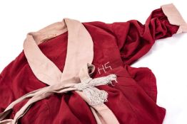 HARRY SECOMBE'S BACKSTAGE SILK ROBE circa 1950s, bearing embroidered 'HS' to breast-pocket, Austin