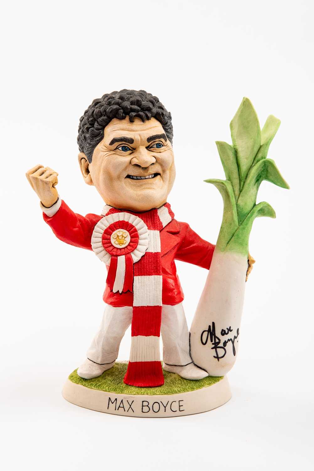 GROGG POTTERY CARICATURE OF ENTERTAINER MAX BOYCE standing in red jacket, with Wales rosette,