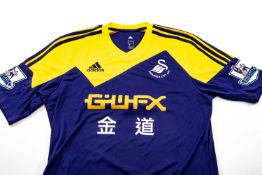 MATCH WORN 2013-14 PREMIER LEAGUE SWANSEA CITY AFC SHIRT, by Adidas, in yellow and blue, worn for