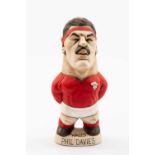 GROGG CARICATURE OF PHIL DAVIES (Grogg Shop Wales) standing on titled base, wearing his Wales No.4