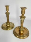 PAIR LOUIS XV STYLE ALLOY CANDLESTICKS, gadrooned sconces, octagonal collars, tapering fluted
