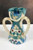 UNUSUAL EWENNY POTTERY TREFOIL VASE, of conical tapering shape with trefoil head, three handles with