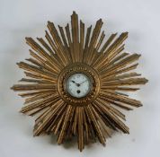 FRENCH GILTWOOD 'SUNBURST' WALL TIMEPIECE, central 3 1/2in. white enamel dial with Arabic