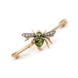 YELLOW METAL BAR BROOCH modelled as an insect brooch with opal eyes, diamond chip wings and