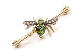 YELLOW METAL BAR BROOCH modelled as an insect brooch with opal eyes, diamond chip wings and