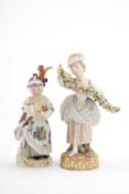 TWO MEISSEN PORCELAIN FIGURINES, 19th century, one modelled as a child wearing plumed headdress,
