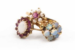 THREE 9CT GOLD RINGS set with various gemstones including seed pearls, opals and rubies, 6.6gms