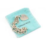 TIFFANY & CO STERLING SILVER BRACELET, circle link with heart pendant, in baby blue Tiffany & Co