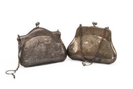 TWO SILVER PURSES, scroll and foliate engraved (2) Provenance: deceased estate Pembrokeshire