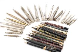 LARGE GROUP OF ASSORTED VINTAGE PROPELLING PENCILS, including coloured plastic and plated metal
