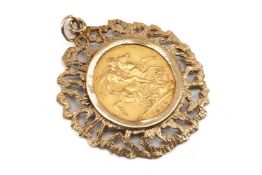 VICTORIAN GOLD SOVEREIGN, 1887, Jubilee head, in 9ct gold pierced bark effect pendant mount, 12.5gms