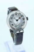 WWI SILVER CASE TRENCH WATCH, with pierced cover, Arabic numerals, cathedral hands, subsidiary
