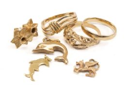 GOLD JEWELLERY comprising 9ct gold dolphin charm and yellow metal example, 9ct gold wedding band,