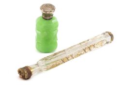 TWO ANTIQUE GLASS PERFUME BOTTLES, comprising Victorian green opaque bottle with hinged silver