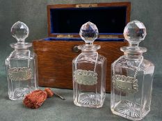 THREE BOTTLE CASED DECANTER BOX, in oak with three whisky decanters in fitted interior, box 24h x