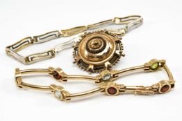 GOLD JEWELLERY comprising 9ct gold shield brooch, 9ct gold multi-gem bracelet and a 9ct gold bi-