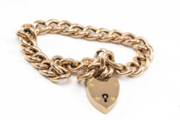 9CT GOLD CURB LINK BRACELET, heart shaped padlock, 10.7gms Provenance: deceased estate