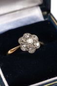 18CT GOLD DIAMOND SEVEN STONE CLUSTER RING, the seven stones totalling 0.4-5cts overall approx.,