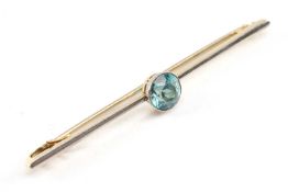 YELLOW & WHITE METAL BLUE ZIRCON BAR BROOCH, 6.5cms wide, 4.9gms