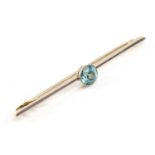 YELLOW & WHITE METAL BLUE ZIRCON BAR BROOCH, 6.5cms wide, 4.9gms