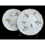 PAIR OF NANTGARW PORCELAIN PLATES circa 1820, of lobed circular form and having moulded borders,