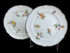 PAIR OF NANTGARW PORCELAIN PLATES circa 1820, of lobed circular form and having moulded borders,