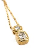 DIAMOND & 18CT GOLD PENDANT, set with emerald-cut diamond 6mm x 4mm, and brilliant-cut diamond 4mm