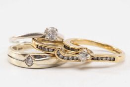 FOUR GOLD RINGS comprising 9ct gold diamond engagement ring with diamond shoulders and matching half