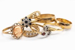 9CT GOLD JEWELLERY comprising nine rings set with various stones including cameo, opals, diamond