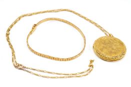 GOLD JEWELLERY comprising 9ct gold engraved circular locket on fine 9ct gold chain together with