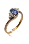 9CT GOLD SAPPHIRE & DIAMOND RING, the central sapphire (6 x 4mms approx.) flanked by six diamonds in