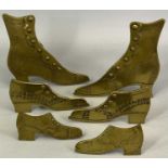 VICTORIAN BRASS 'BUTTONED BOOT' FIRESIDE ORNAMENTS, 3 PAIRS - 13.5cms H, 6cms H and 4.5cms H