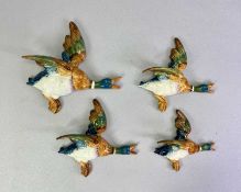 BESWICK FLYING DUCK WALL ORNAMENTS - a graduated set of three, Nos 596/2, 596/3, 596/4, 21cms the