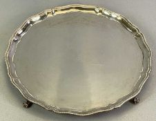 SILVER CIRCULAR SALVER - on four ball and claw feet, Birmingham 1939, Maker Barker Brothers Silver