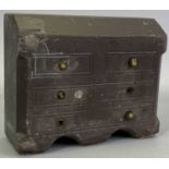 WELSH FOLK ART - carved slate doorstop in the form of a bureau chest with brass knobs (some absent),