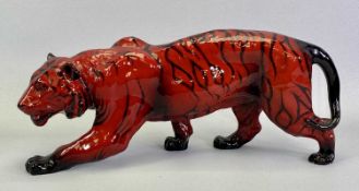 ROYAL DOULTON FLAMBE 'STALKING TIGER' - with black stripes, maker's mark to front paw, 36cms L
