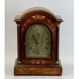 EDWARDIAN INLAID MAHOGANY DOME TOP MANTEL CLOCK - turned columns flanking the arched glazed door,