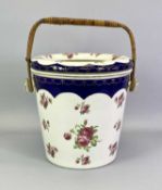 WEDGWOOD & CO IMPERIAL PORCELAIN TOILET SET - cream glazed and decorated with roses, the blue border